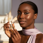 Black woman with deep skin in a calm acne-safe skincare moment for Chin and Jaw Acne on Dark Skin: How to Think Through Common Patterns