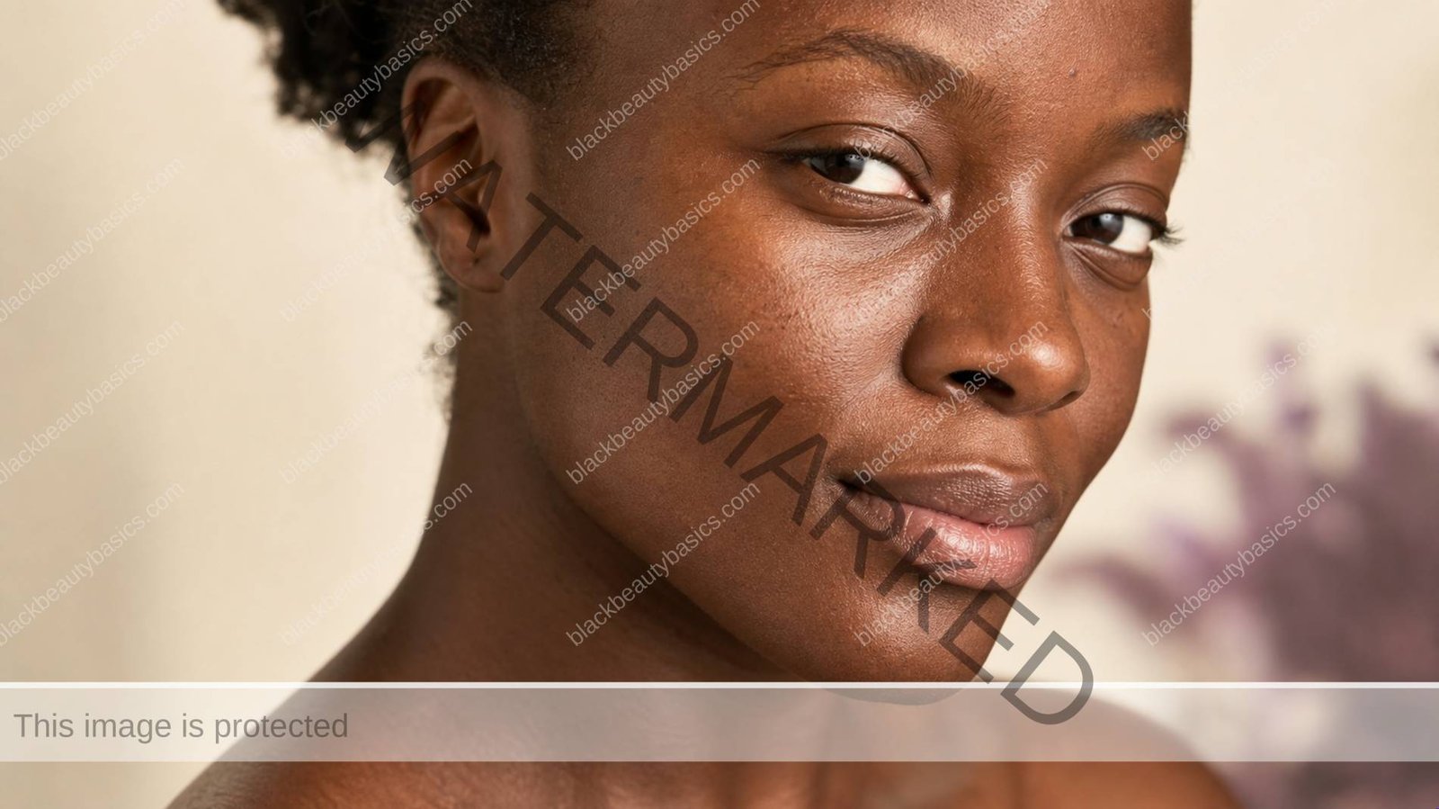 Close editorial view of natural rich brown skin texture in gentle morning light