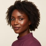 Black woman with rich brown skin in an editorial portrait for what to do when your skin looks dull but feels sensitive